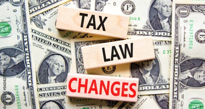 Tax law changes symbol. Concept words Tax law changes on wooden blocks ...